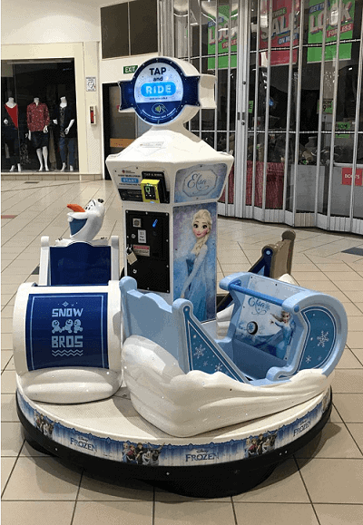 Nayax's contactless payment device on a kiddies ride See the many benefits of Nayax's cashless payment devices at the EAG International 2019 Expo.