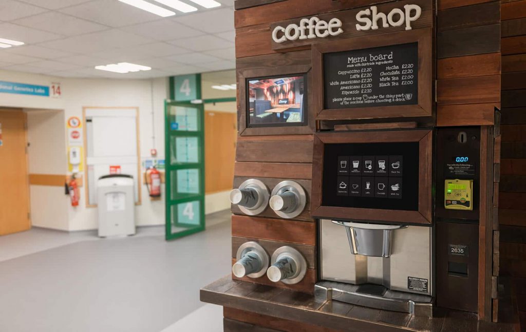 Pay for your cup of coffee with a contactless card or mobile phone at a coffee vending machine fitted with a Nayax card reader