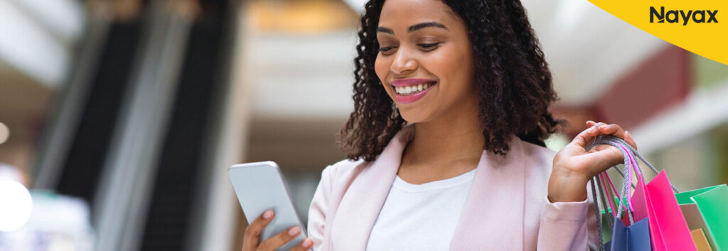 woman smiling at phone