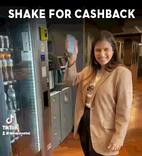 woman shaking phone for cashback